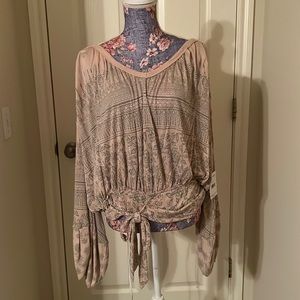 Free People, size medium top. NWT. Retails for $108.